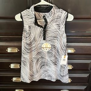 Tail White Label golf top. UPF50 rated. Size Large. Never worn.